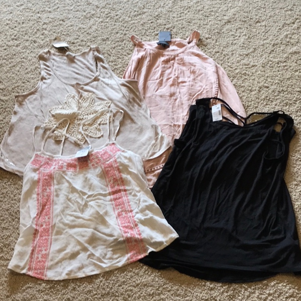 New with tags, size medium tank top lot